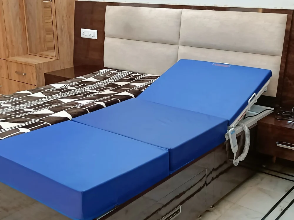 Recliner bed backrest in upright position